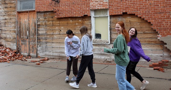 Students in the UNK interior and product design program visit the Marcellus Building in downtown Franklin earlier this year. They’re working with community officials and the South Central Economic Development District on a project that would turn the historic property into affordable housing. (Courtesy photo)
